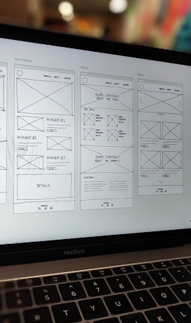 Success Stories 5 Laptop displaying wireframe website design – parlot AI strategic planning and workflow optimization
